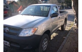 Tapetes bege Toyota Hilux cabina única (2004 - 2012)